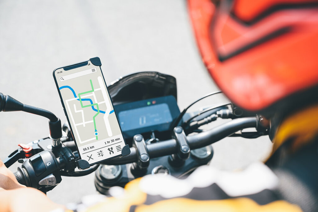 phone attached to motorcycle handlebar